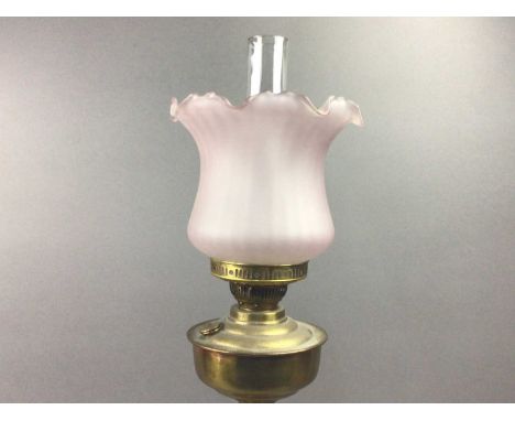 VICTORIAN GILT BRASS AND SIMULATED MARBLE CORINTHIAN OIL LAMP,with clear chimney and ribbed satin glass shade, 79cm high