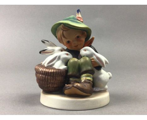 GROUP OF HUMMEL FIGURES,of various designs, along with a Royal Doulton figure of children selling flowers and three Royal Dou