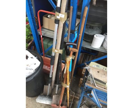 Two bundles of garden tools 
