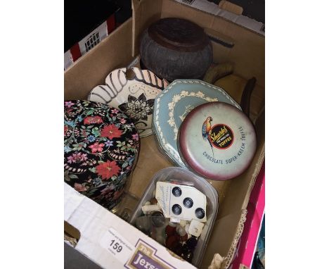A box of misc vintage tins, African carved bowl, soapstone dish, buttons, crumb tray and brush. 