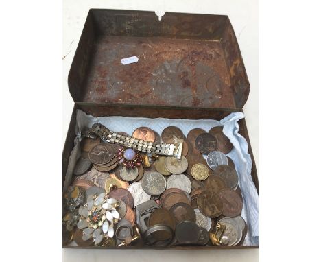 A vintage box of coins and jewellery 