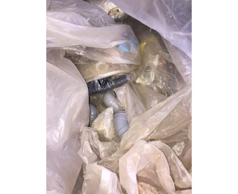 A bag of pipe fittings. 