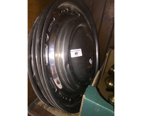 Four vintage Austin 1800 wheel trims 