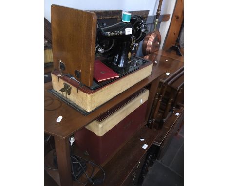 A cased electric Singer Class 99K sewing machine, with lead &amp; foot pedal 