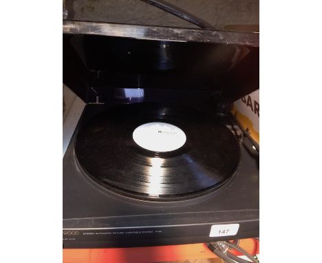 A Kenwood record player deck 