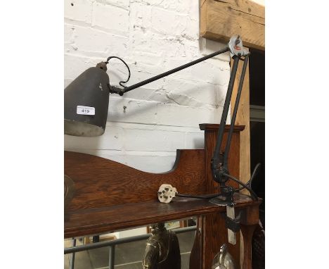 A vintage Planet angle poise lamp with clamp base 
