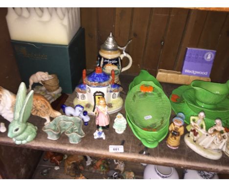 Shelf of ornaments and pottery 