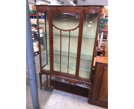 An Edwardian inlaid mahogany display cabinet on tapered legs with lower shelf. 