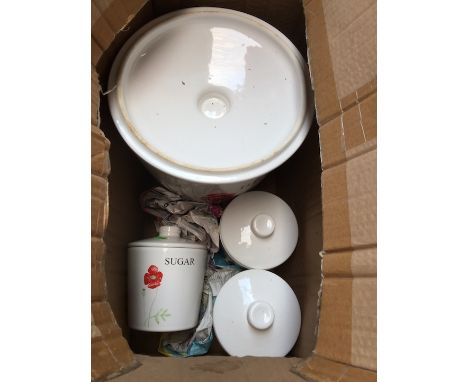 A kitchen set of 4 ceramic items - Sugar, Tea, Coffee and Bread bin. 