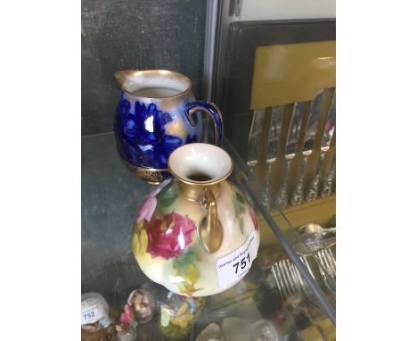 Small Royal Worcester vase painted with roses and a Doulton blue and gilt jug 