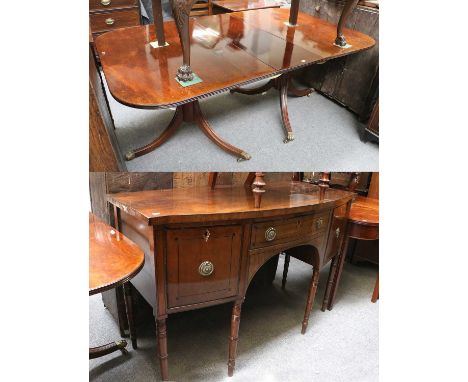 George III Mahogany Twin Pillar Dining Table, with one additional leaf, with clips, raised on turned supports to three splaye