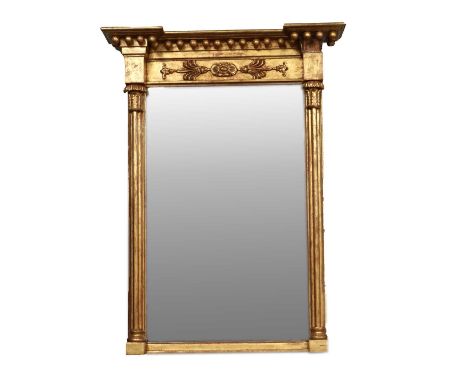 A Regency Over Mantel Mirror, in giltwood frame of architectural form, bevelled glass plate, 93cm high by 66cm wide