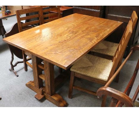 A Mango Wood Table with Trestle Base and Four Ropework Ladder Back Chairs, 160cm by 94cm 77cmThe top has is constructed from 