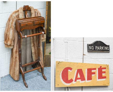 'No Parking' sign, 'CAFE' sign, fur coat and a valet stand