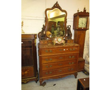 19th Century French walnut commode dressing chest with a swing mirror above two drawers, the rouge marble inset top above fou