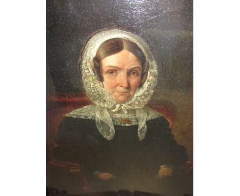 19th Century English school, oil on panel, portrait of a seated lady wearing a lace headdress holding spectacles and a letter