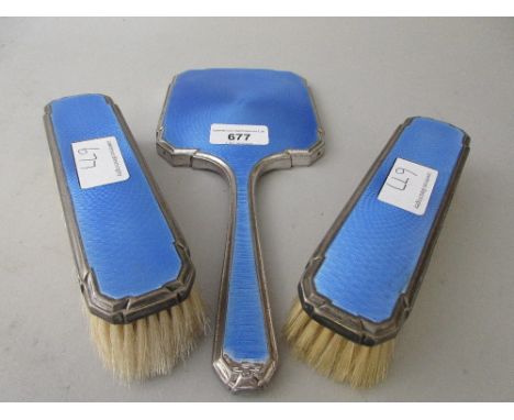 Silver and blue translucent enamel three piece dressing table set comprising: mirror and two brushes 