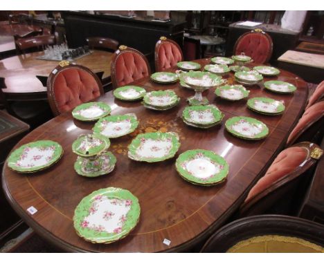19th Century English forty one piece dessert service decorated with pink roses on an apple green gilt ground with provenance 