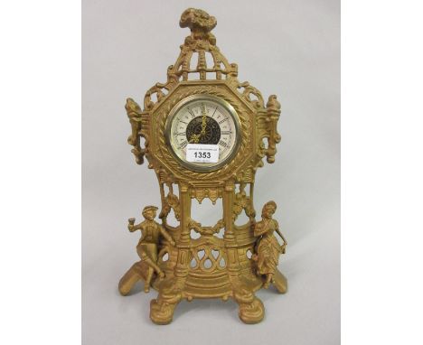 Gilt brass mantel clock mounted with figures together with a small Camerer Cuss and Co. mantel clock 