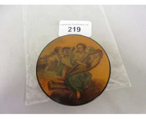 Early 19th Century papier mache snuff box, the cover decorated with cherub musicians, enclosing a tortoiseshell inner linerSm