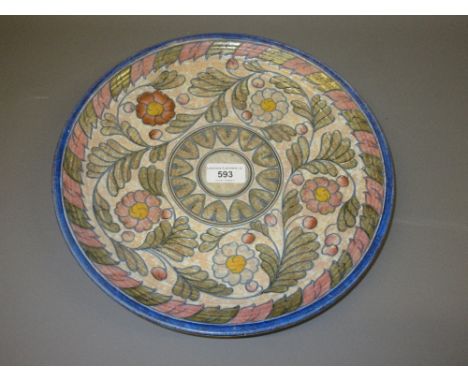 Crown Ducal Charlotte Rhead circular pottery charger with tube lined floral decoration, 12.5ins diameter 