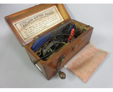 Early 20th Century stained wooden cased Magneto electric machine with original leaflet 