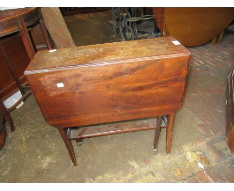 Edwardian mahogany Sutherland table on square tapering supports with brass and ceramic castors 