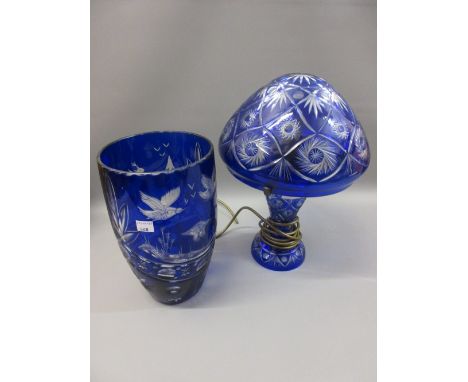 Bohemian blue overlay clear glass mushroom form table lamp, together with a similar vase engraved with animals and birdsBoth 