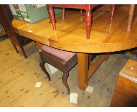 Modern French light oak circular extending dining table with two extra leaves together with a set of four matching ladder bac