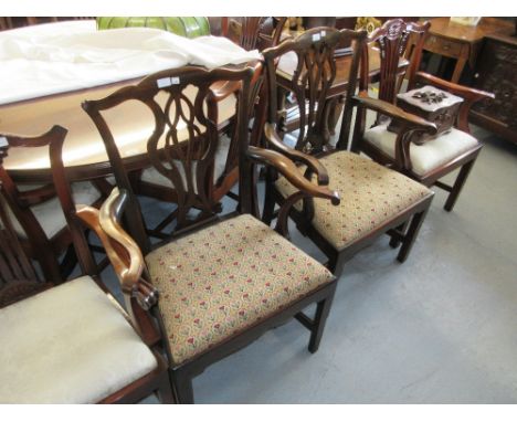 Near pair of 19th Century mahogany Chippendale style open armchairs with drop-in seats raised on square chamfered supports wi