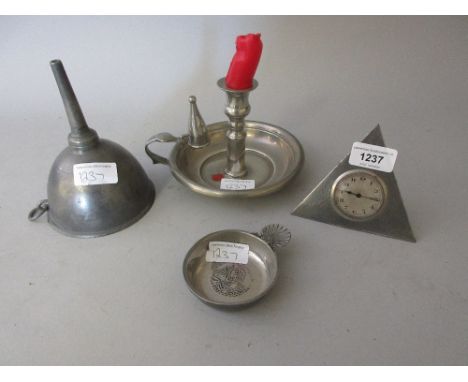 Triangular pewter mounted mantel clock, a tasse du vin, wine funnel and modern pewter chamber stick 