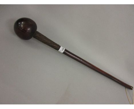 19th Century African hardwood knobkerrie, the tapering handle with metal wire binding to the upper section 