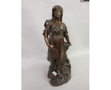 19th Century dark patinated bronzed figure of a woman playing a lute on a naturalistic base, 21ins high 