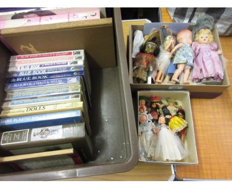 Two small boxes containing a collection of hard plastic 20th Century dolls, bag of various doll books, eight various ' Blue B