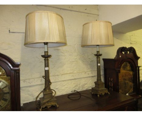 Pair of 20th Century French Empire style patinated metal table lamp bases with tapering columns and square platform bases, ra