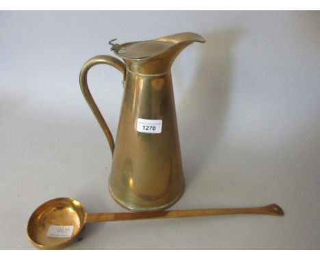 Copper lidded jug and a brass ladle 