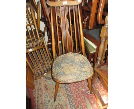 Set of six Ercol (four plus two) stick back dining chairs with a circular extending Ercol type kitchen table 