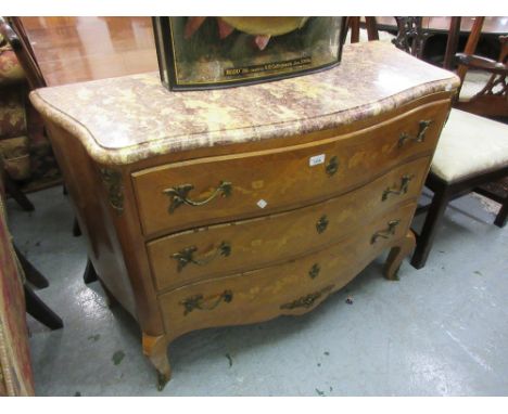 Early 20th Century French Kingwood floral marquetry inlaid commode with a rouge marble top above three drawers with brass han