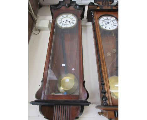 Late 19th Century Continental walnut and ebonised Vienna style wall clock, the enamel dial with Roman numerals and two train 