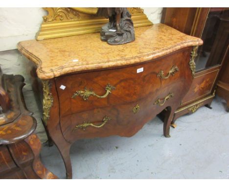 Early 20th Century French kingwood floral marquetry inlaid ormolu mounted commode, the shaped marble top above two drawers ra