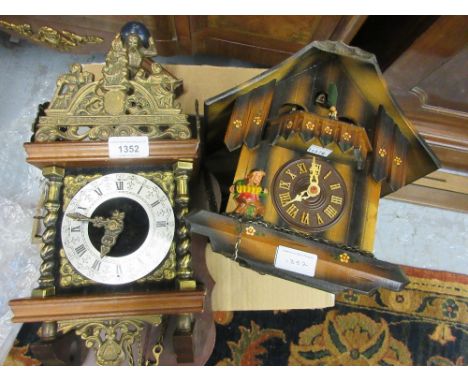 Reproduction Dutch style wall clock together with a reproduction Swiss cuckoo clock 