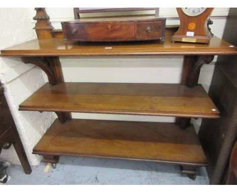 Good quality 19th Century oak three tier buffet of Gothic Revival design, the shaped and carved back above three moulded shel