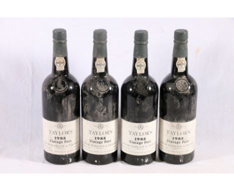 Four bottles of TAYLOR'S 1985 vintage port, bottled in Oporto in 1987 and imported for Taylor, Fladgate and Yeatman by Deinha
