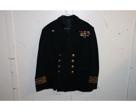 British Royal Navy dress uniform jacket having Gieves Ltd label "Capt P J Pycraft", with brass naval buttons with AH for Alfr