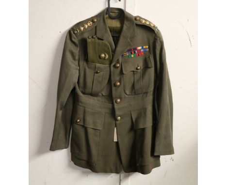 British Army dress uniform jacket having "Quo Fata Vocant" brass buttons by Jennens and Co Ltd of London, Northumberland Fusi