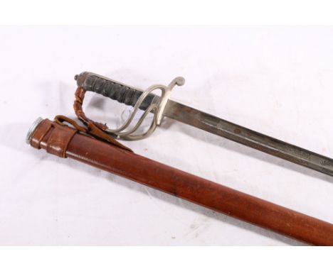 British officers sword with three bar Gothic type guard, etched blade with Royal Artillery designs, fish skin grip, blade bac