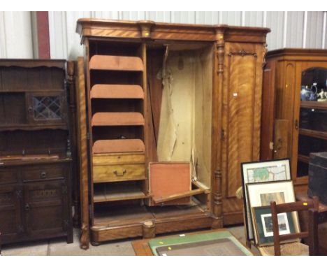 A Victorian satin wood triple wardrobe 