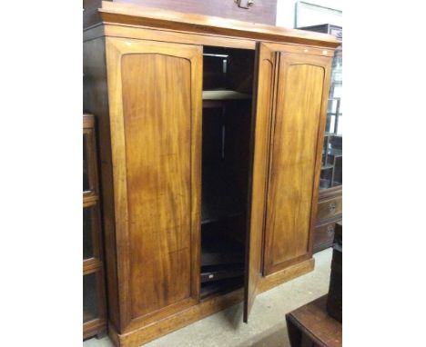 A late Victorian mahogany triple wardrobe 