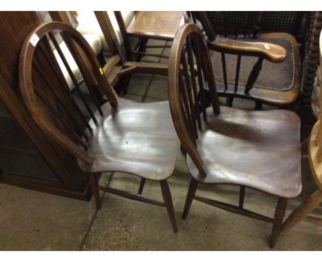 Two stick back chairs 