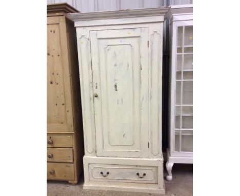 A painted pine single door wardrobe fitted single drawer below 